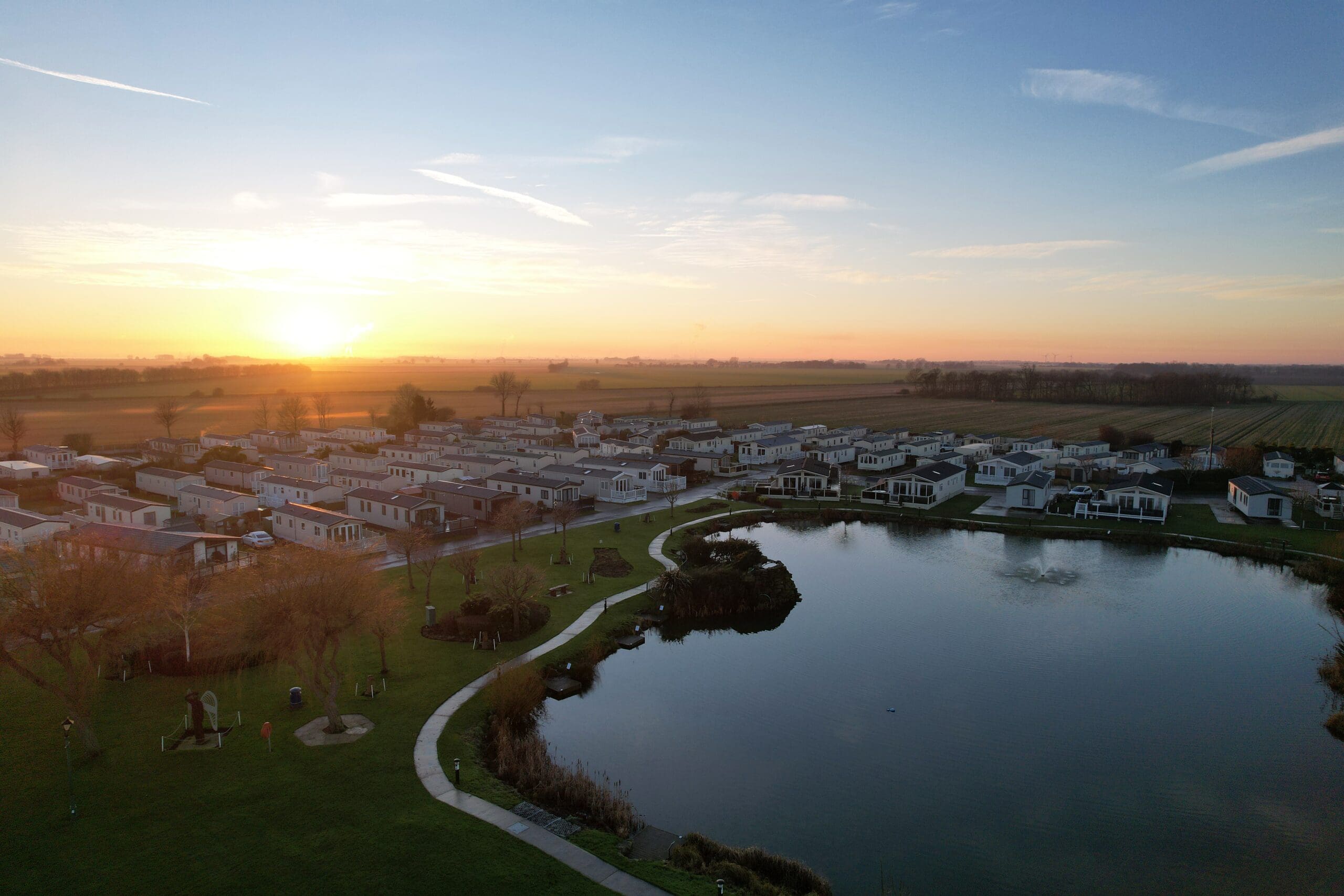 Aerial view of the landscaped grounds and lake at Patrington Haven Leisure Park